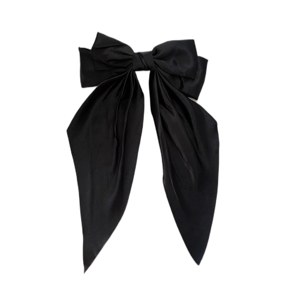 le clair de lune “Blondie” hair bow. Black.